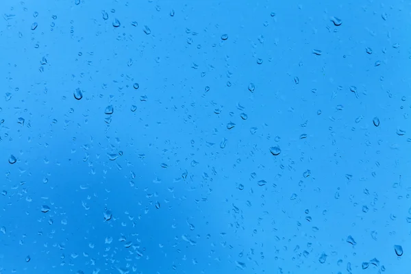 Gotas de agua sobre vidrio — Foto de Stock