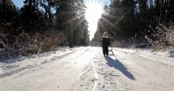 Children boy and girl playing in big snow in winter. Happy child playing in snow — 비디오