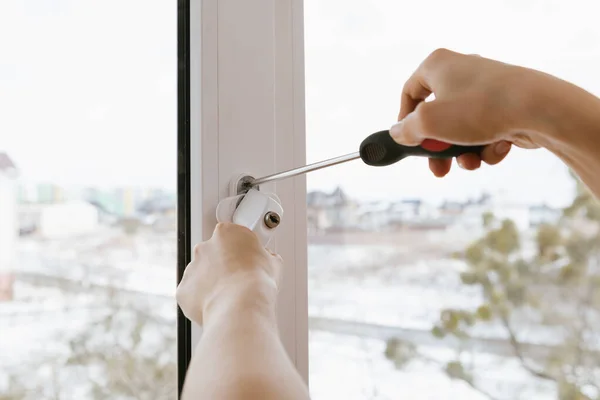 The worker installing and checking window in the house — Stock Photo, Image