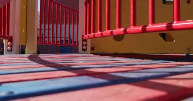 child running on the playground