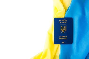 Ulusal bayrağın arka planına karşı Ukrayna 'nın uluslararası pasaportu. Ukrayna 'ya savaş