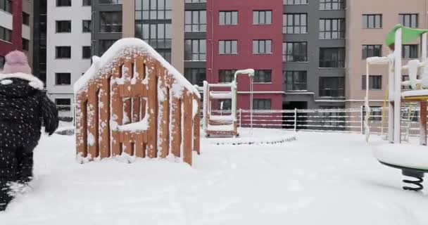Child Winter Playground Little Child Play Slide Winter Snow Covered — Stock Video
