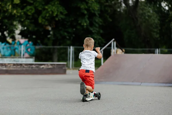 Active Boy Riding Scooter Summer Skate Park — Stok fotoğraf
