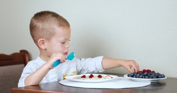 Boy Eats Porridge Kitchen Concept Happy Family Healthy Eating Children — Stock Video
