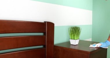 Housekeeper cleaning with wet wipe on wooden cabinet. High quality 4k footage