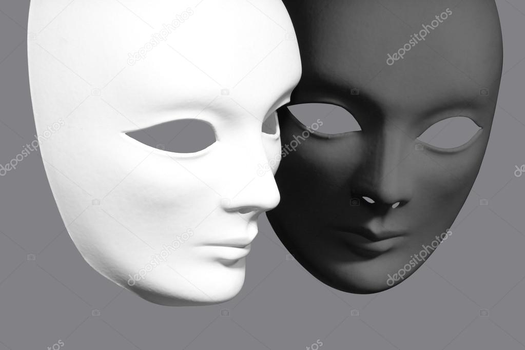 Two plaster Venetian masks