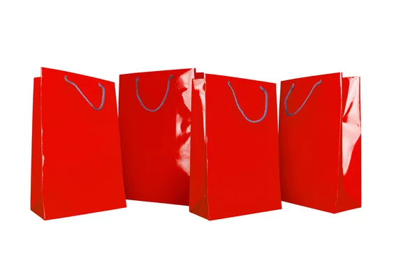 Sacos de compras de papel vermelho — Fotografia de Stock