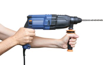 Elektrikli çekiç matkabı - perküsyon delgisi, beyaz arka planda izole edilmiş.