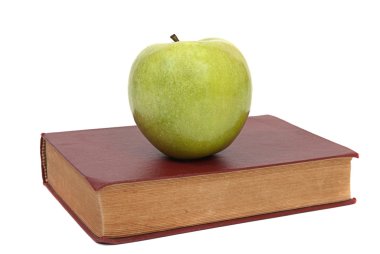 eski kitap ve yeşil elma