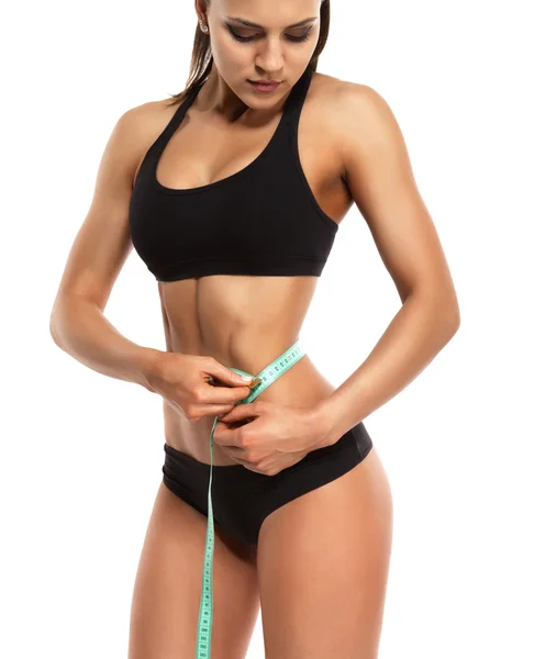 Woman measuring the hips — Stock Photo, Image