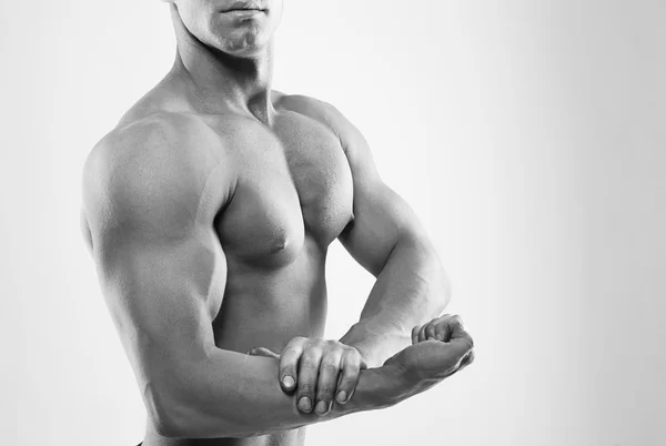 Muž zobrazeno biceps — Stock fotografie