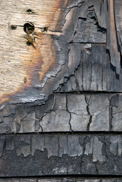 The scorched wooden background. — ストック写真