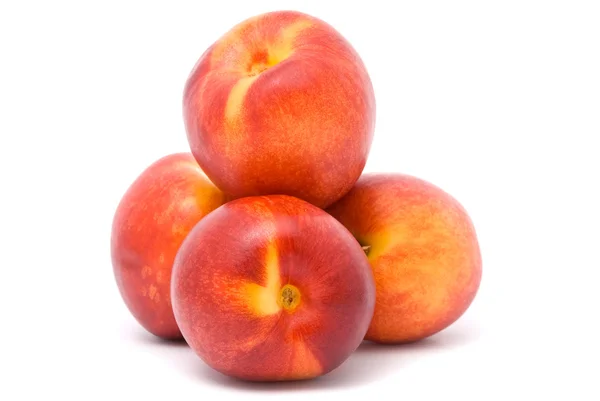 Juicy nectarines on a white background — Stock Photo, Image