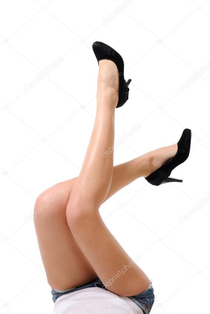 Long pretty woman legs isolated on white background