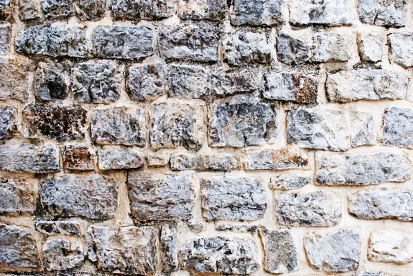 ヴィンテージの石造り壁の背景 ロイヤリティフリーのストック写真