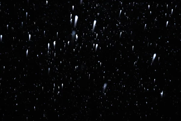 Echter Fallender Schnee Auf Schwarzem Hintergrund Zur Verwendung Als Texturschicht — Stockfoto