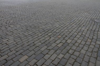 Soyut arkaplan. Eski taş kaldırımın dokusu ve detayları.