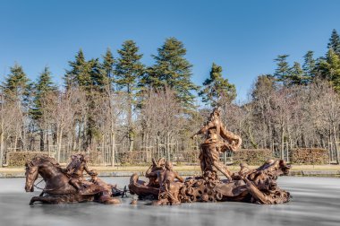 Horse Race fountain at La Granja Palace, Spain clipart