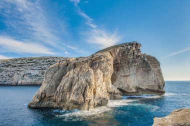 Fungus Rock, on the coast of Gozo, Malta clipart