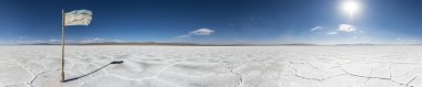 Flag on the Salinas Grandes in Jujuy, Argentina. clipart