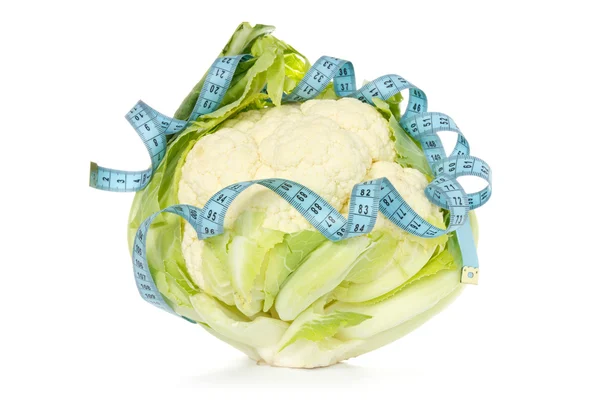 Cauliflower wrapped by measure tape — Stock Photo, Image