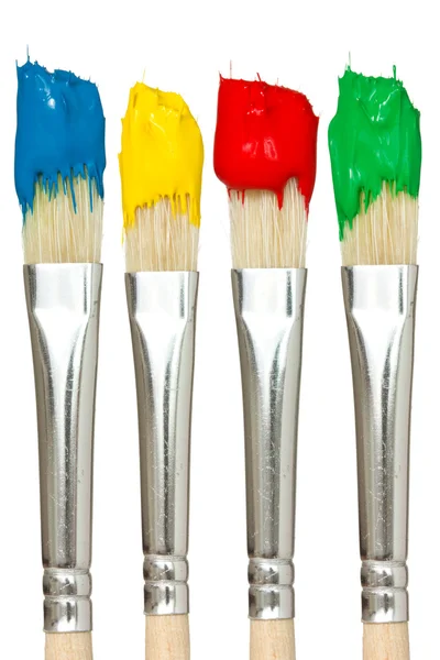 Vier Pinsel mit Farbe Farben — Stockfoto