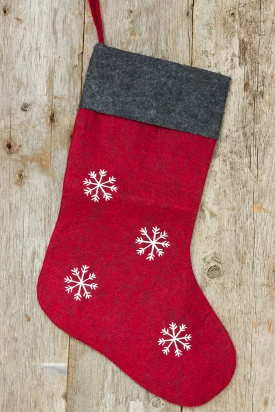 Christmas sock hung on the wooden wall — Stockfoto