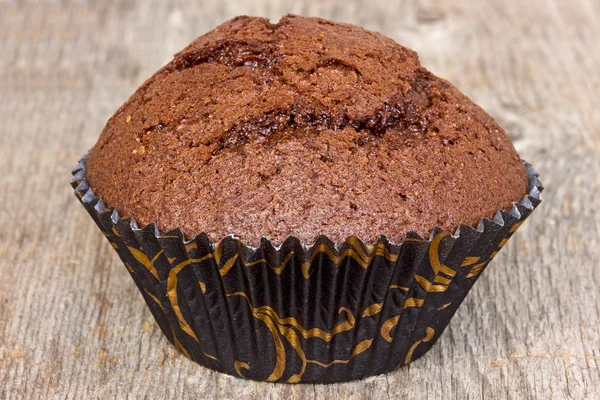 Muffin on the wooden plank — Stock Photo, Image