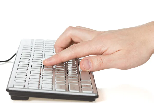 Hand typing on computer keyboard — Stock Photo, Image