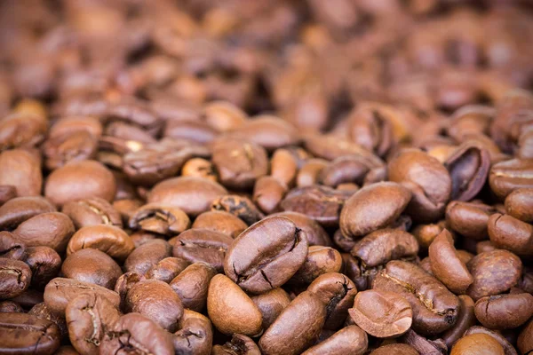 Palone ziarna kawy w tle — Zdjęcie stockowe