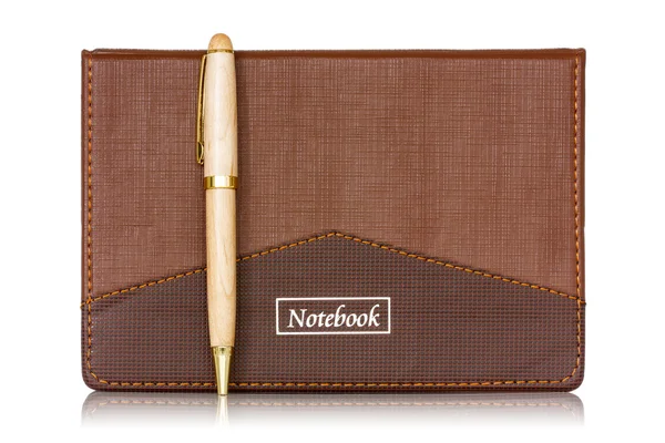 Caderno marrom e caneta — Fotografia de Stock