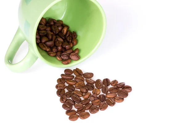 Cup en koffie bonen hart — Stockfoto