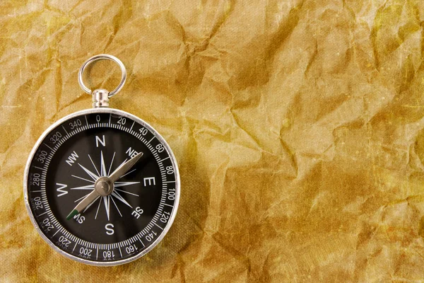 Compass on the grunge background — Stock Photo, Image