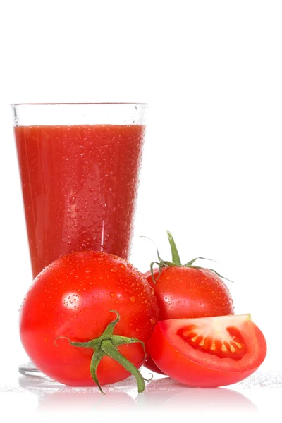 Tomato juice and ripe tomatoes — Stock Photo, Image