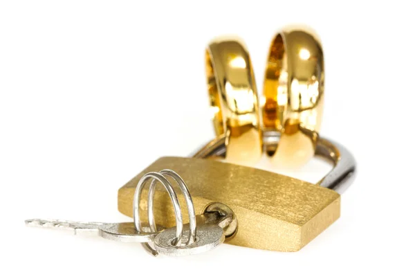 Padlock with golden rings on white background — Stock Photo, Image