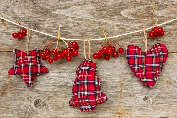 Vánoční ozdoba s červenými bobulemi — Stock fotografie