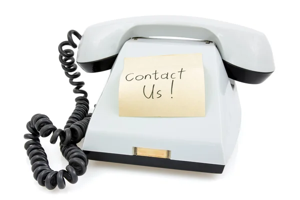 Telephone with sticky note Contact Us — Stock Photo, Image