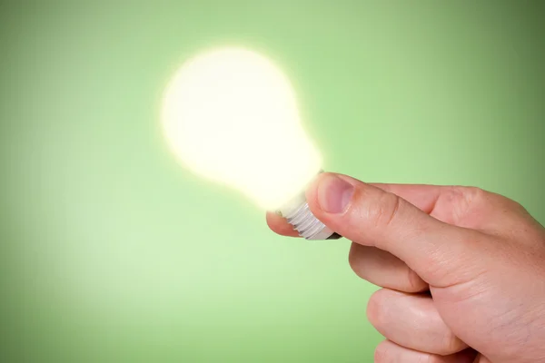 Mano con idee lightbulb — Foto Stock