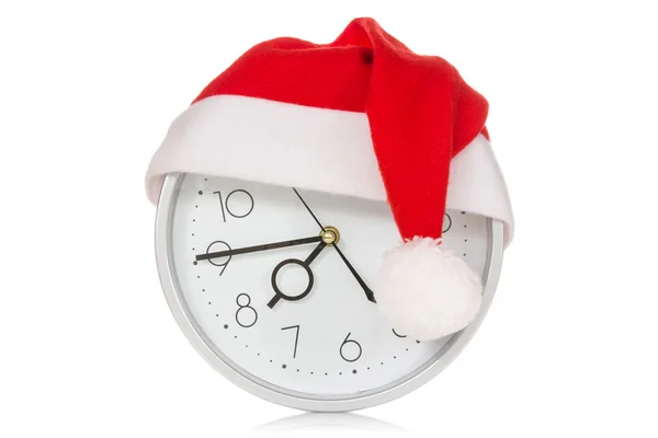 Relógio com chapéu de Natal santa — Fotografia de Stock