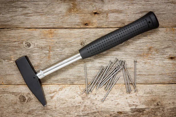 Modern hammer and nails — Stock Photo, Image