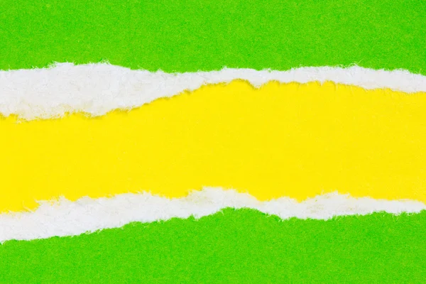 Рваной бумаги желтого и зеленого цвета — стоковое фото