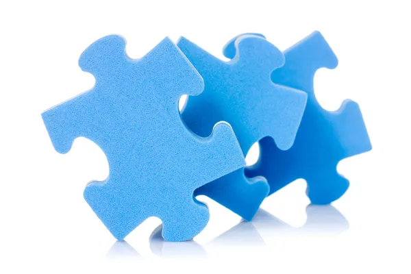 Three puzzle pieces on white — Stock Photo, Image