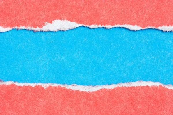 Рваной бумаги красного и синего цвета — стоковое фото