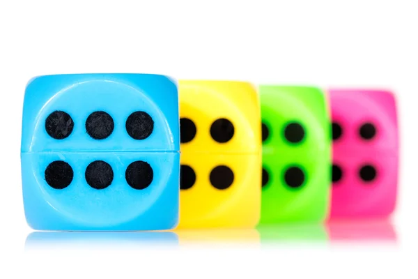 Colorful dice aligned — Stock Photo, Image