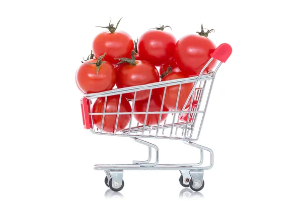 Tomatoes in shopping cart — Stock Photo, Image