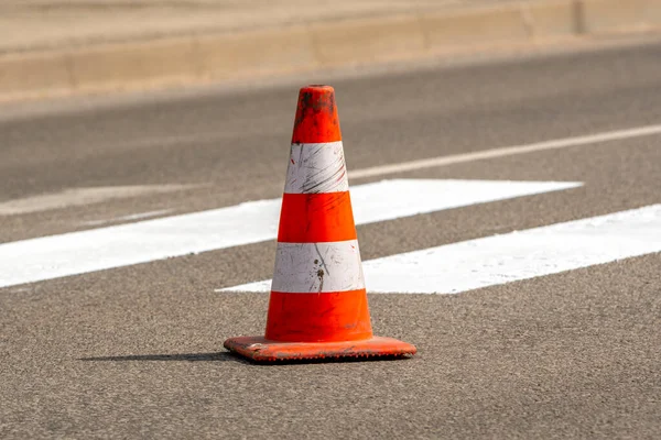 Traffic Cone Orange White Stripes Standing Street Gray Asphalt Road — стоковое фото