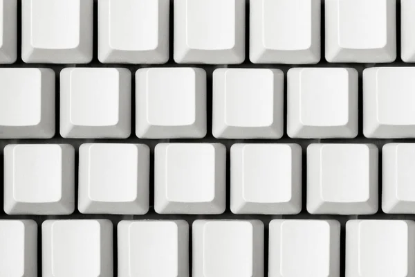 コンピュータのキーボードを閉じる 空白のキーに自分の文字を置くことができます — ストック写真