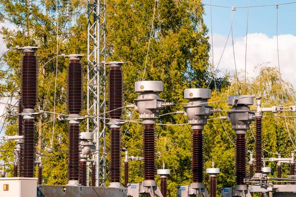 Transmission line field in a transformer station. Current measuring transformers, voltage measuring transformers, high voltage switches, disconnectors