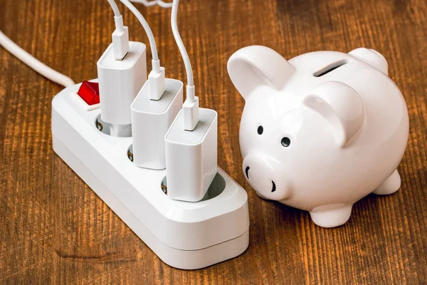 White Piggy Bank Electric Extension Cord Concept Energy Savings Home — Stock Photo, Image