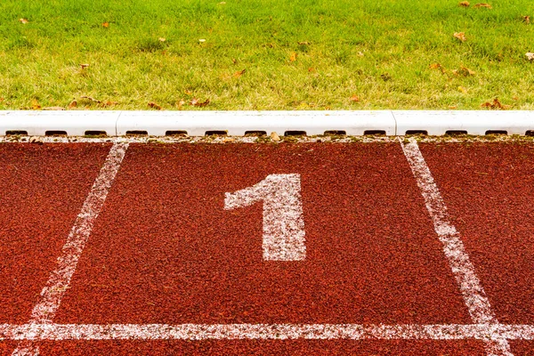 Nummer Vid Startpunkten För Löpning Spår Eller Idrottare Spår Stadion — Stockfoto